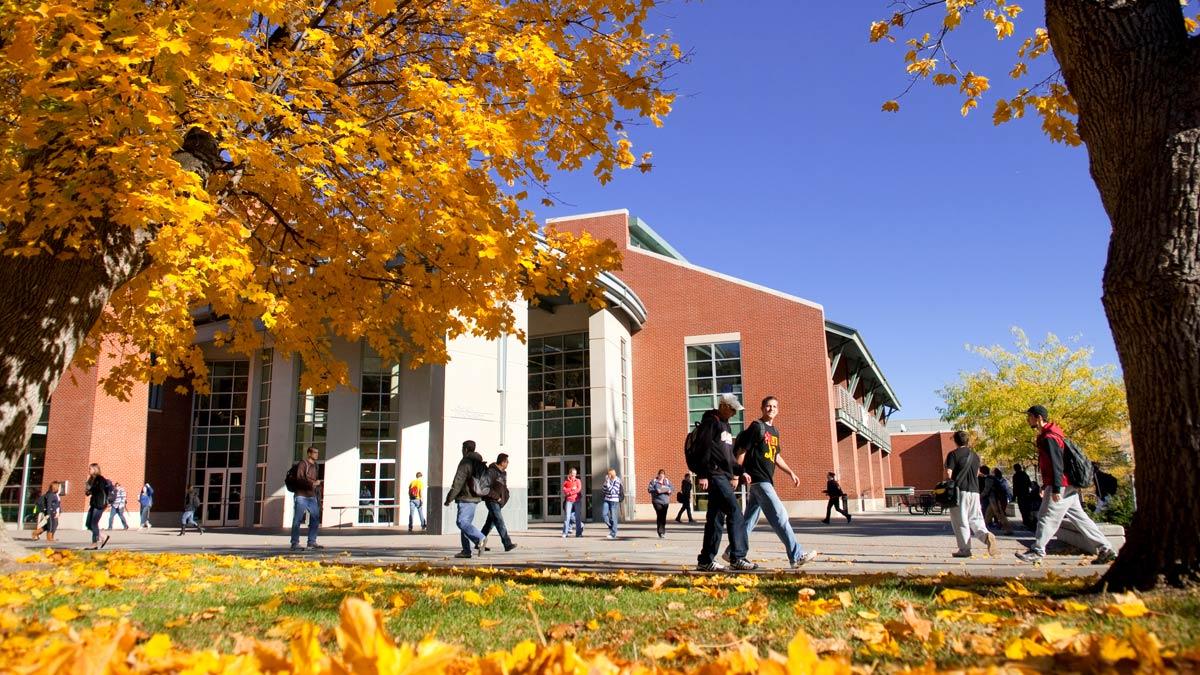 The Idaho Student Union Building at midday, bustling with students.